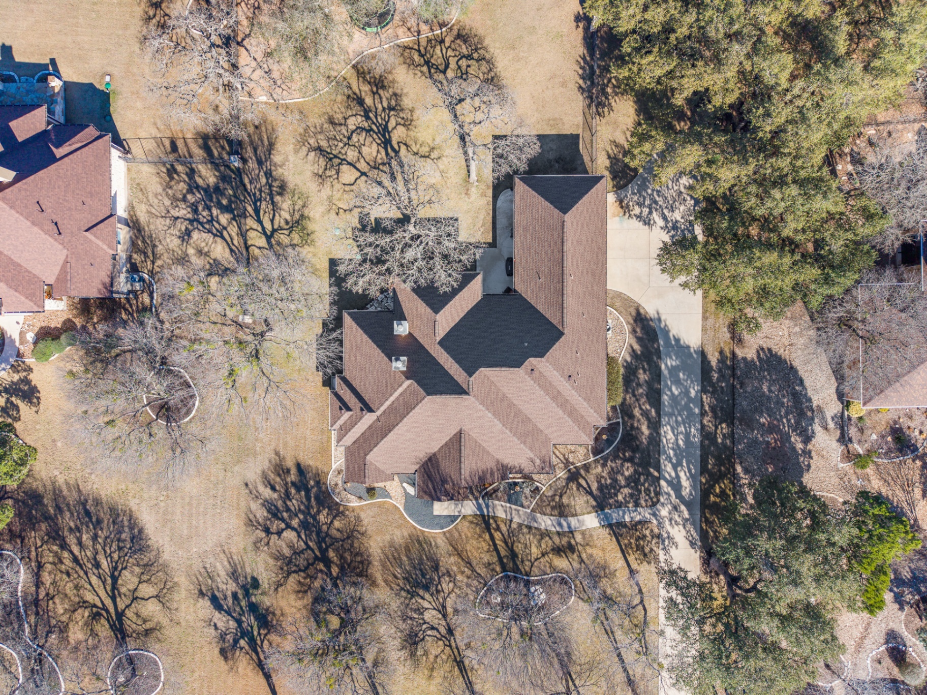 Top-down aerial view showing full home footprint and one acre lot
