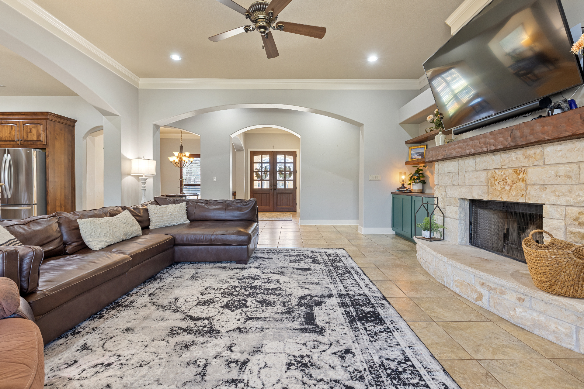 Wide view of living room showing high ceilings and open layout